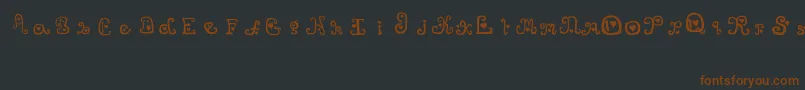 Шрифт ThatsAmore – коричневые шрифты на чёрном фоне