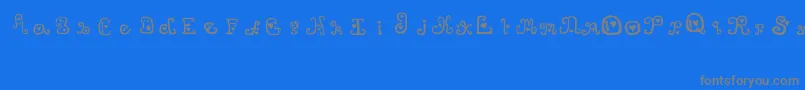 フォントThatsAmore – 青い背景に灰色の文字