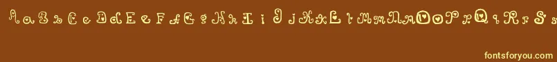 ThatsAmore-fontti – keltaiset fontit ruskealla taustalla