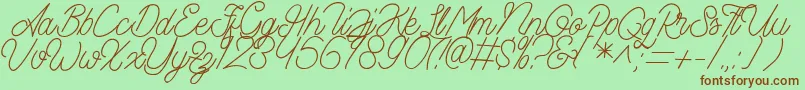 Aamonoline Font – Brown Fonts on Green Background