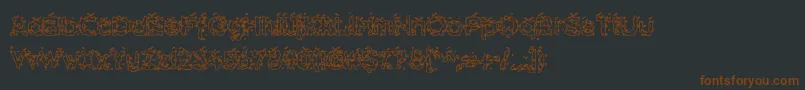 Шрифт HammeroidHollow – коричневые шрифты на чёрном фоне