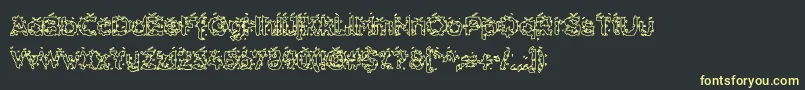 HammeroidHollow-fontti – keltaiset fontit mustalla taustalla