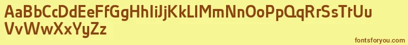 AbsolutProMediumReduced Font – Brown Fonts on Yellow Background