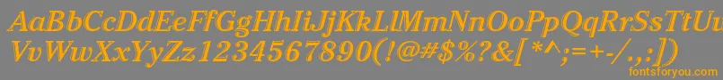 CheltenhamstdHdtooledbdit-Schriftart – Orangefarbene Schriften auf grauem Hintergrund