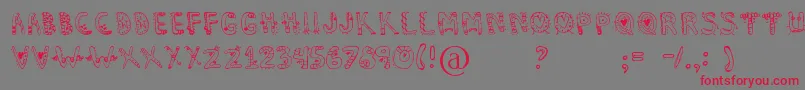 フォントDennealiens – 赤い文字の灰色の背景