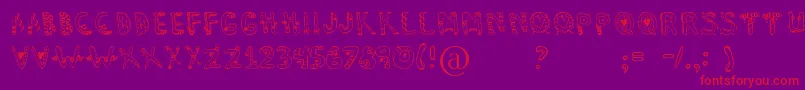 Dennealiens Font – Red Fonts on Purple Background