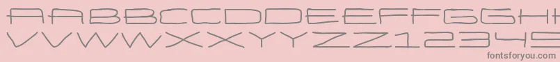 EneasexpandedBold-Schriftart – Graue Schriften auf rosa Hintergrund