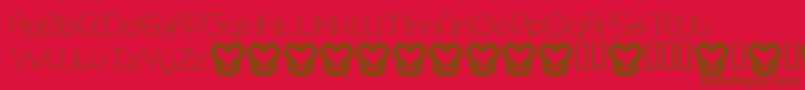 MegalomaniaNormal-fontti – ruskeat fontit punaisella taustalla