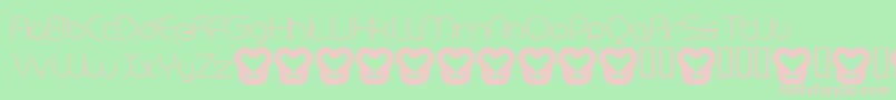 MegalomaniaNormal-fontti – vaaleanpunaiset fontit vihreällä taustalla