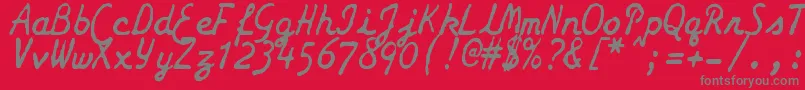 ZaiSmithCoronagalaxietypewriter-fontti – harmaat kirjasimet punaisella taustalla