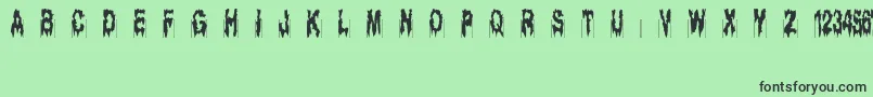 フォントGhostbayou – 緑の背景に黒い文字