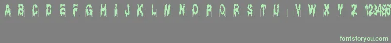 Ghostbayou Font – Green Fonts on Gray Background