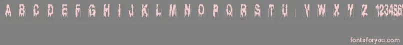 Ghostbayou Font – Pink Fonts on Gray Background