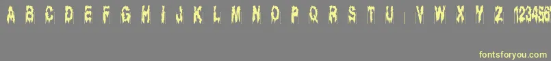 Ghostbayou Font – Yellow Fonts on Gray Background