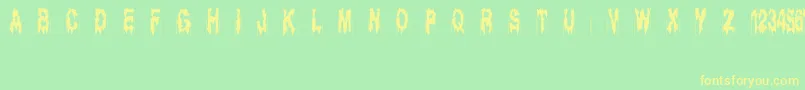 Шрифт Ghostbayou – жёлтые шрифты на зелёном фоне