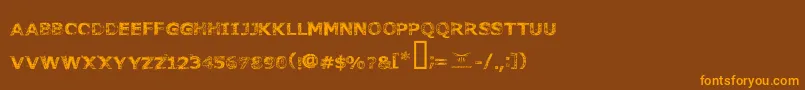 Czcionka Fonttoachainsaw – pomarańczowe czcionki na brązowym tle