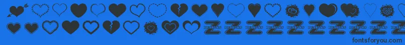 SexyLoveHearts2-Schriftart – Schwarze Schriften auf blauem Hintergrund