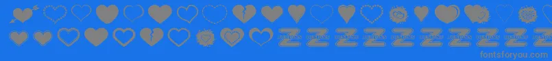 SexyLoveHearts2-Schriftart – Graue Schriften auf blauem Hintergrund