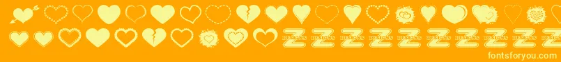 SexyLoveHearts2-Schriftart – Gelbe Schriften auf orangefarbenem Hintergrund