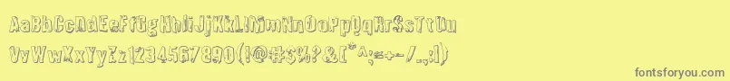 Шрифт Quarrystone3D – серые шрифты на жёлтом фоне