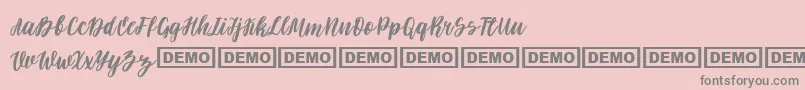 フォントDarflow – ピンクの背景に灰色の文字