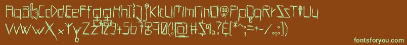 フォントHellsKittchenDevilGodBold – 緑色の文字が茶色の背景にあります。