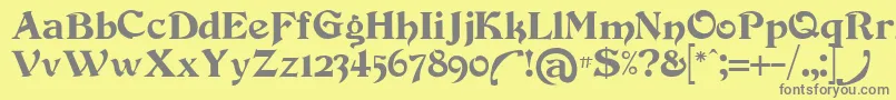 Devinneswash-fontti – harmaat kirjasimet keltaisella taustalla