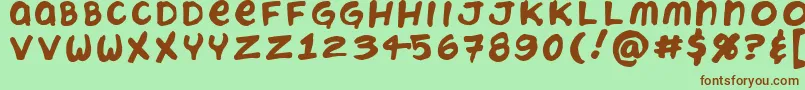 ChatteryTeeth Font – Brown Fonts on Green Background