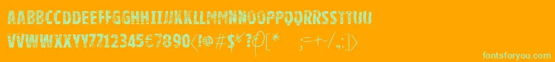 Vtksgoodluckforyou-Schriftart – Grüne Schriften auf orangefarbenem Hintergrund