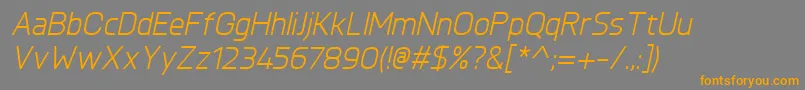 フォントKnulItalic – オレンジの文字は灰色の背景にあります。