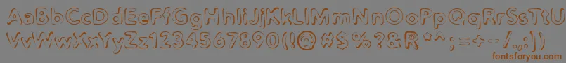 Fonte Distro2Squidgey – fontes marrons em um fundo cinza