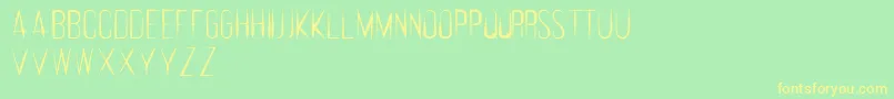 Fonte FeralRegular – fontes amarelas em um fundo verde