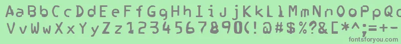 フォントCorrupter – 緑の背景に灰色の文字