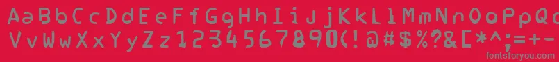 フォントCorrupter – 赤い背景に灰色の文字