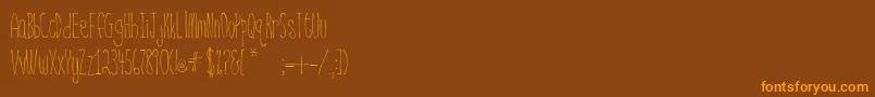 BsdNantucket Font – Orange Fonts on Brown Background