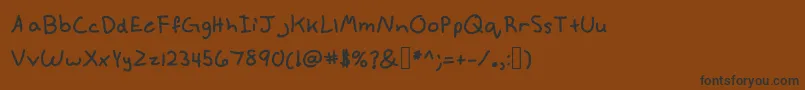 フォントAnnekebold – 黒い文字が茶色の背景にあります