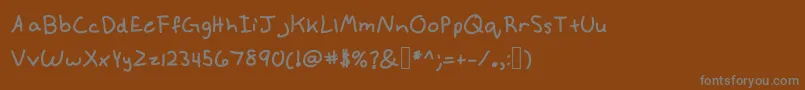 Annekebold Font – Gray Fonts on Brown Background