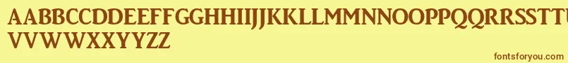 Czcionka Bigtownebold – brązowe czcionki na żółtym tle