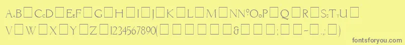 LiviaMedium-fontti – harmaat kirjasimet keltaisella taustalla