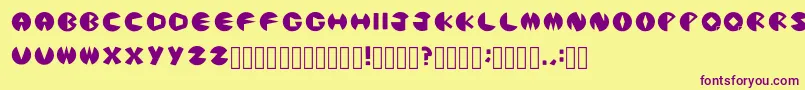 PacmanicRegular Font – Purple Fonts on Yellow Background