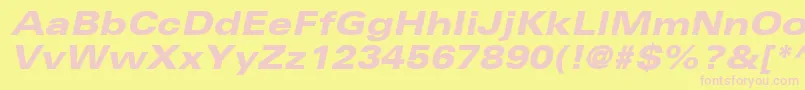NovaBlackExpandedSsiExtraBoldExpandedItalic-fontti – vaaleanpunaiset fontit keltaisella taustalla