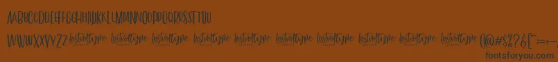 VayenthaSans Font – Black Fonts on Brown Background