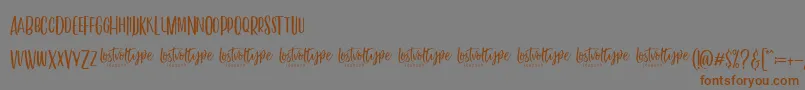 VayenthaSans-Schriftart – Braune Schriften auf grauem Hintergrund