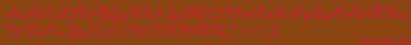 MfYellowButterflies Font – Red Fonts on Brown Background