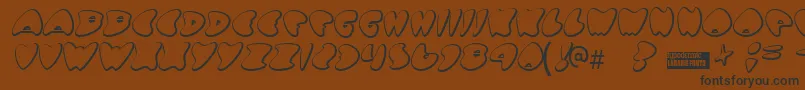 Gotnohea Font – Black Fonts on Brown Background