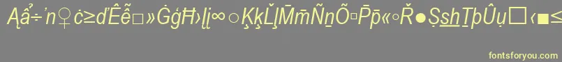 ArialNarrowSpecialG2Italic-fontti – keltaiset fontit harmaalla taustalla