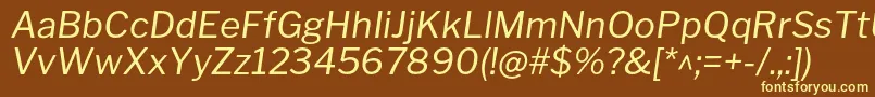 LibrefranklinItalic-fontti – keltaiset fontit ruskealla taustalla