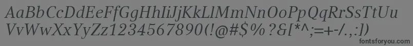 フォントCompatilTextLtComItalic – 黒い文字の灰色の背景