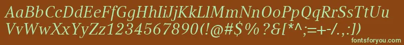フォントCompatilTextLtComItalic – 緑色の文字が茶色の背景にあります。