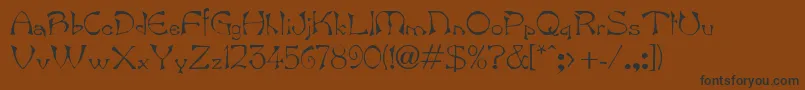 フォントBambergdbBold – 黒い文字が茶色の背景にあります